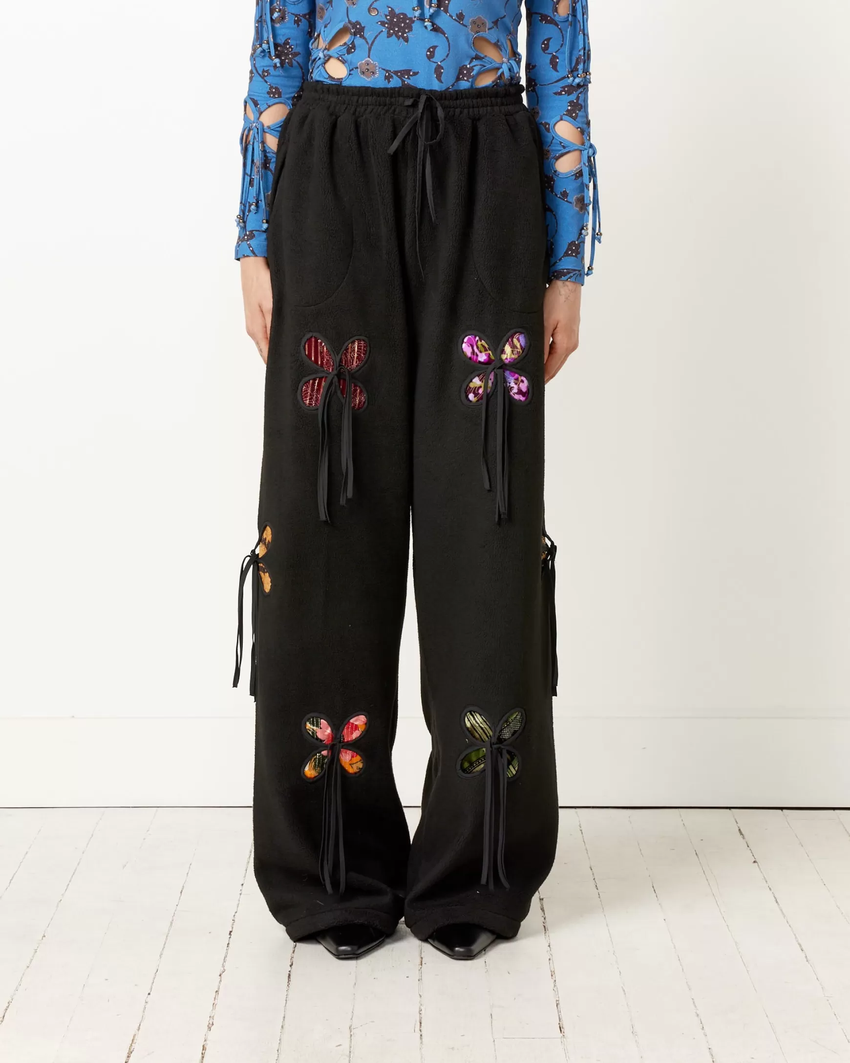 Shop Reversible Fleece Petal Pants Woman Pants