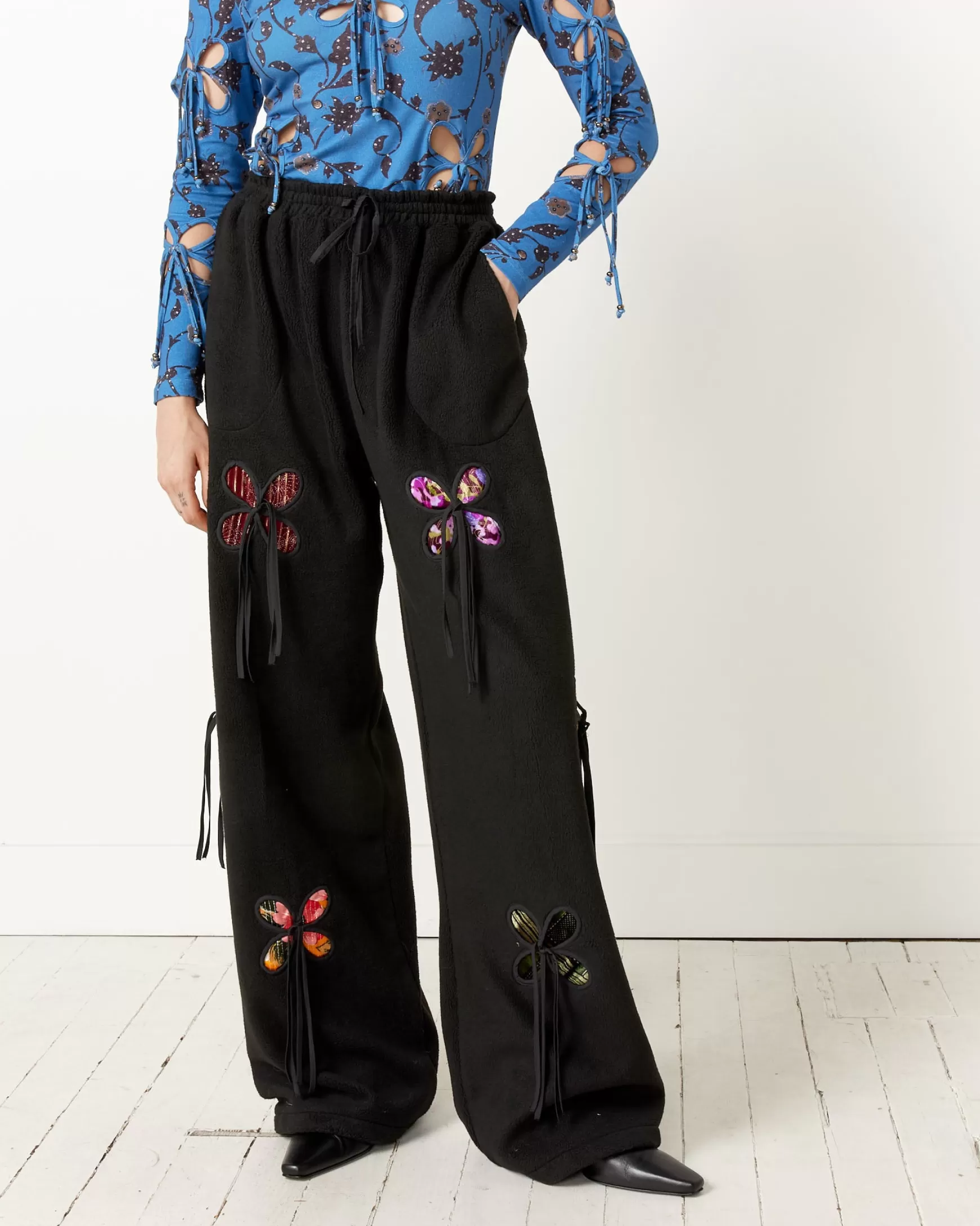 Shop Reversible Fleece Petal Pants Woman Pants